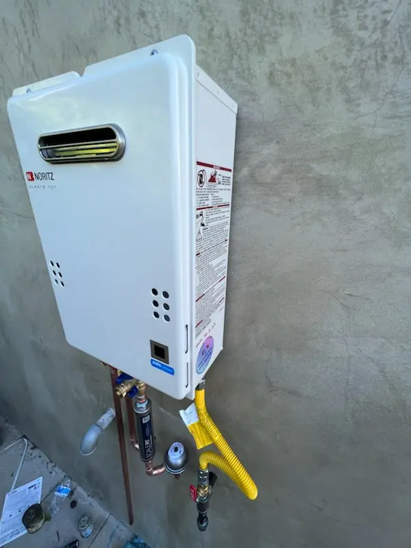 Tankless water heater installation for Adams Square homes